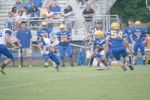 Gunnar Hensley (10) scrambles into the open field. (Photo/Kay Hensley)