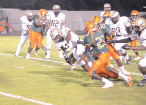 Jerrell Suber-O'Neal plows through the Shamrock defense. (Photo/Joe Seibles)