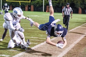 Jacob McGuire sails out of bounds Thursday after hauling in a David Isreal pass. (Photo/Kristy Kimball Massey)
