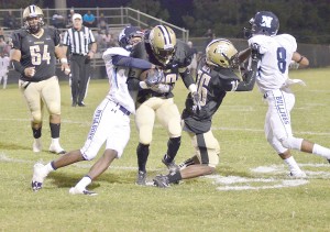 Tony Ruff (29) grinds out a run against Newberry Friday. (Photo/DeAnna Robinson)