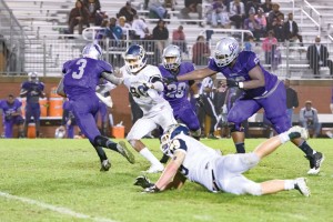 Amon Bosier (90) brings pressure to Ridge View's Tre' High (3). (Photo/Kristy Kimball Massey)
