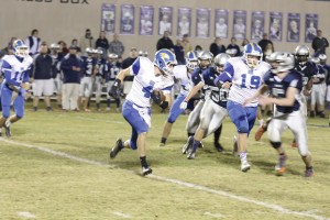 John Coleman (4) breaks a long run Friday at Greenwood. (Photo/Martha Ladd)