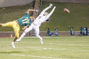 David Isreal's pass sails out of reach of Kenny Benton (4) and Spring Valley's Shaun Moore. (Photo/Kristy Kimball Massey)