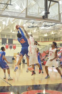Jalen Robinson (20) puts up a defensive battle for the Hawks. (Photo/DeAnna Robinson)