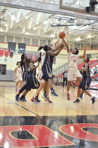 Westwood's Taylor Britt (34) battles it out with Blythewood's Makayla Weeks. (Photo/DeAnna Robinson)