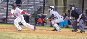 Deuntrey Gallman strokes an RBI single into center. (Photo/Ross Burton)