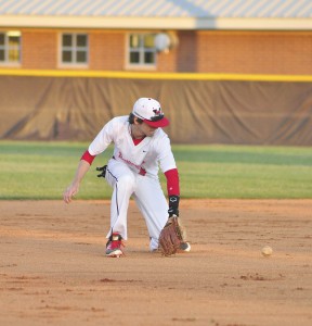 Westwood's T.J. White digs out a ground ball Tuesday vs. Lugoff-Elgin. (Photo/DeAnna Robinson)
