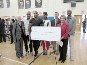 Blythewood High School graduate and NFL Pro-Bowl defensive back Justin Bethel presented a check for $100,000 to the Blythewood High School Education Foundation on Friday. Shown with Bethel are Dr. Sharon Buddin, Chairwoman of the BHS Education Foundation; Gabriel Bethel (brother); Brenda Bethel (mother); Dr. Keith Price, Richland School District 2 Assistant Superintendent, BHS Principal Brenda Hafner and BHS Athletic Director Vince Lowry. (Photo/Barbara Ball)