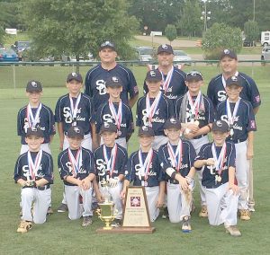 The Blythewood Minors – front: Ryan Watts, Landon Smith, Sammy Franklin, Jackson Bottar, Alex Myers, Evan Todd; middle: Landon Penfield, Jeb Britt, Miller Stuck, Jack Sanderson, Harrison Collins, John Rollings; back: coaches Ken Britt, Les Penfield and Buzzy Myers.