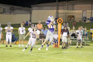 Jimmy McKeown (13) hauls in a Mitchell Gibbons pass. (Photo/Martha Ladd)