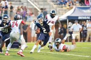 Jordyn Adams (2) carves up the Westwood defense. (Photo/Ross Burton)