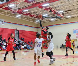 Mya Belton (23) puts one up in the lane. (Photo/Ross Burton)